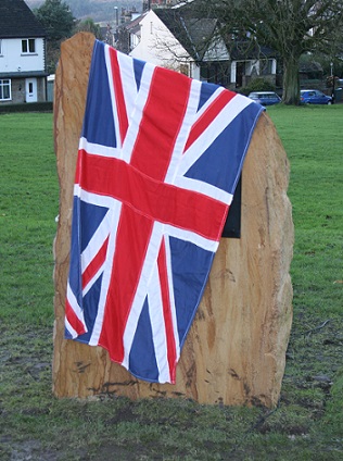 flag on memorial stone